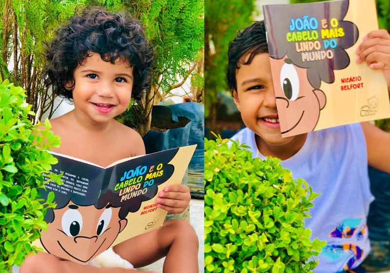 Os irmãos Benjamin e Lucas com o livro - Fotos: Júnior Carvalho